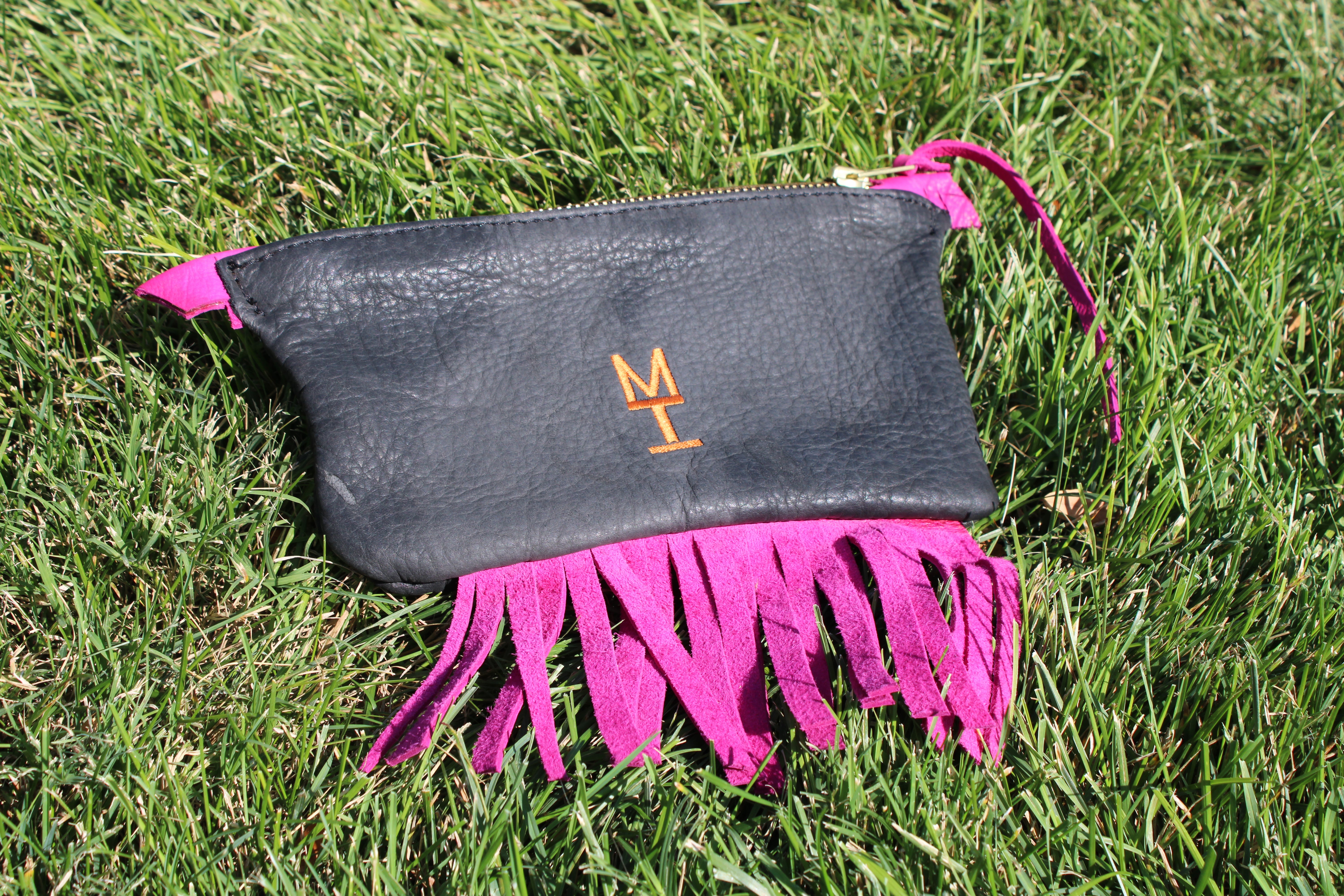 Collection of Black Bison Clutch with Pink Fringe and Authentic Louis Vuitton Canvas Accents. in a gallery layout